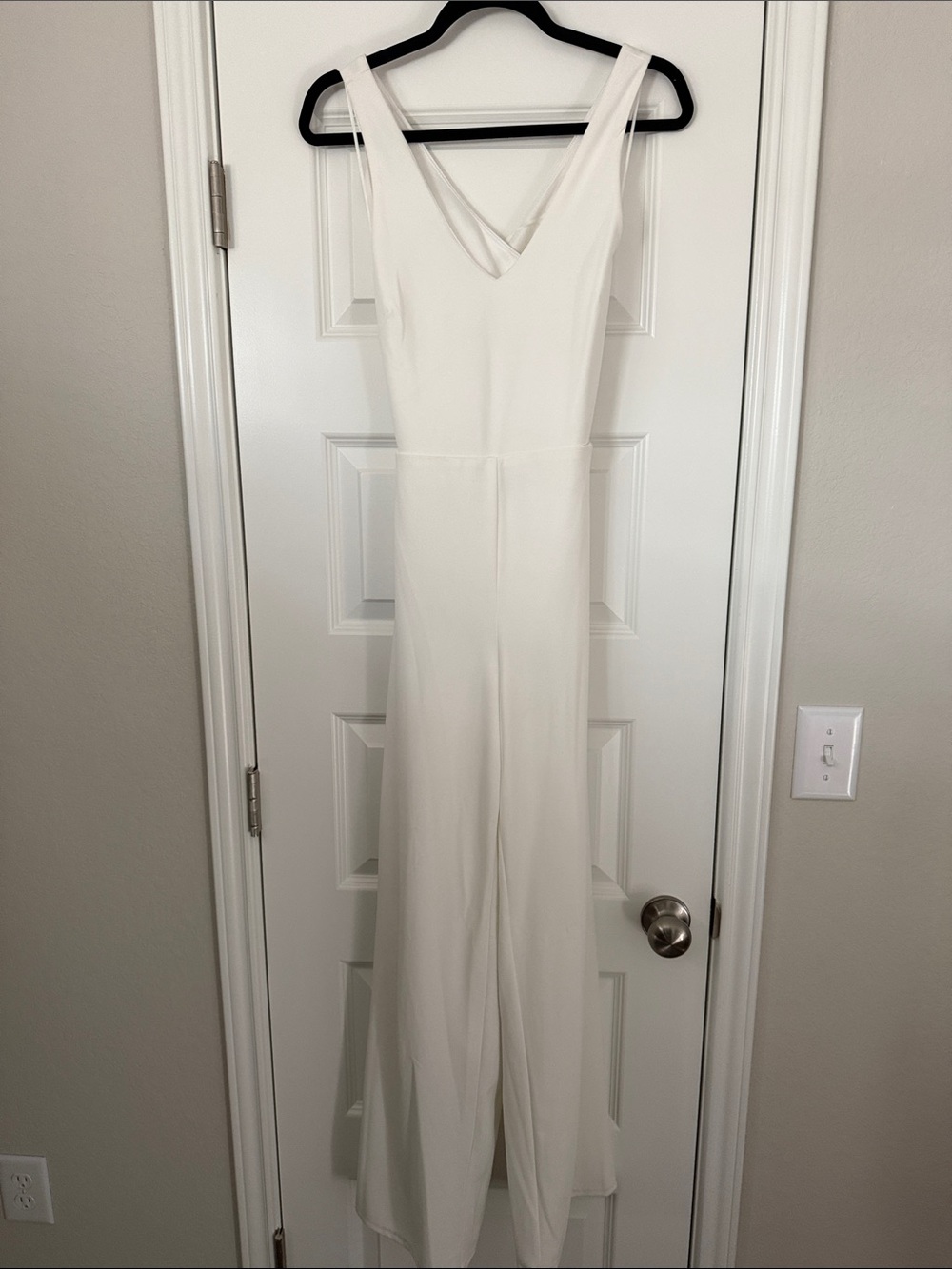 White Sleeveless V-Neck Jumpsuit